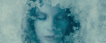 Movie still from “Underworld: Awakening” (2012), directed by Björn Stein – A woman's face in a frozen window; Extreme Close Up shot, Overhead angle