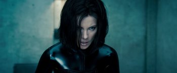 Movie still from “Underworld: Awakening” (2012), directed by Björn Stein – A person with long hair; Close Up shot, Low angle
