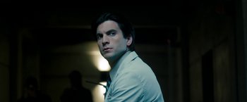 Movie still from “Underworld: Awakening” (2012), directed by Björn Stein – A person wearing a white shirt; Close Up shot, Low angle