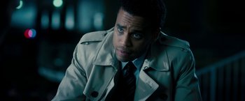 Movie still from “Underworld: Awakening” (2012), directed by Björn Stein – A person wearing a suit and tie; Close Up shot, High angle