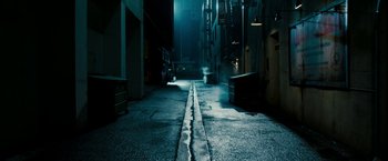 Movie still from “Underworld: Awakening” (2012), directed by Björn Stein – An empty street at night in a dark city; Extreme Wide shot, High angle