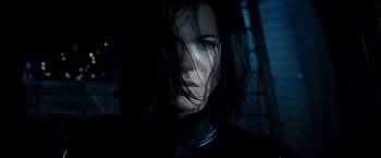 Movie still from “Underworld: Awakening” (2012), directed by Björn Stein – A person with long black hair; Close Up shot, Low angle