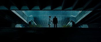 Movie still from “Underworld: Awakening” (2012), directed by Björn Stein – A man and a woman standing in front of a building; Extreme Wide shot, Low angle