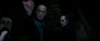 Movie still from “Underworld: Awakening” (2012), directed by Björn Stein – A man and a woman dressed as vampires; Medium shot, Low angle
