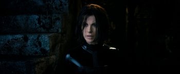 Movie still from “Underworld: Awakening” (2012), directed by Björn Stein – A person wearing a black outfit; Close Up shot, High angle