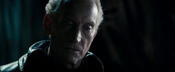 Movie still from “Underworld: Awakening” (2012), directed by Björn Stein – An old man with a gray beard looking into the distance; Close Up shot, Over the shoulder angle