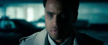 Movie still from “Underworld: Awakening” (2012), directed by Björn Stein – A man's face in the dark; Close Up shot, Over the shoulder angle