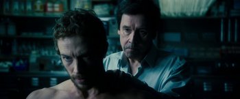 Movie still from “Underworld: Awakening” (2012), directed by Björn Stein – A man is looking at another man who is looking at him; Close Up shot, Over the shoulder angle