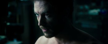 Movie still from “Underworld: Awakening” (2012), directed by Björn Stein – A person with a beard; Close Up shot, Over the shoulder angle