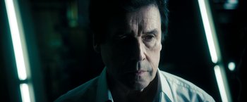 Movie still from “Underworld: Awakening” (2012), directed by Björn Stein – A person wearing a white shirt; Close Up shot, Low angle