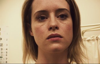 Movie still from “Unsane” (2018), directed by Steven Soderbergh – A person's face with long eyelashes; Close Up shot, Low angle