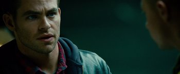 Movie still from “Unstoppable” (2010), directed by Tony Scott – A person wearing a jacket; Close Up shot, Over the shoulder angle