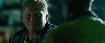 Movie still from “Unstoppable” (2010), directed by Tony Scott – A person with blond hair; Close Up shot, Over the shoulder angle