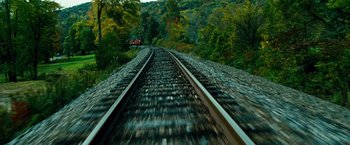 Movie still from “Unstoppable” (2010), directed by Tony Scott – A view of a train track from the ground level; Extreme Wide shot, High angle