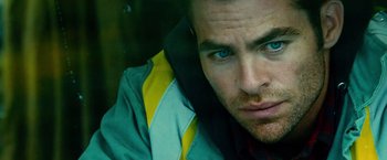 Movie still from “Unstoppable” (2010), directed by Tony Scott – A man's face with blue eyes; Close Up shot, Low angle