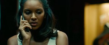 Movie still from “Unstoppable” (2010), directed by Tony Scott – A person wearing a white shirt; Close Up shot, Over the shoulder angle