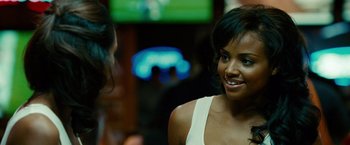 Movie still from “Unstoppable” (2010), directed by Tony Scott – Two women talking to each other in front of a television; Close Up shot, Over the shoulder angle