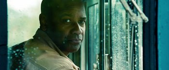 Movie still from “Unstoppable” (2010), directed by Tony Scott – A person looking out of a window; Close Up shot, Over the shoulder angle