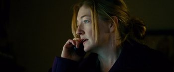 Movie still from “Unstoppable” (2010), directed by Tony Scott – A person talking on a cell phone; Close Up shot, Low angle