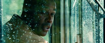 Movie still from “Unstoppable” (2010), directed by Tony Scott – A person looking out of a window; Close Up shot, Over the shoulder angle