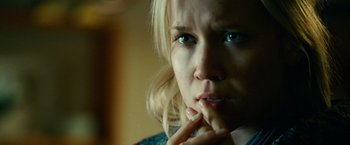 Movie still from “Unstoppable” (2010), directed by Tony Scott – A person with her hand on her chin; Close Up shot, Over the shoulder angle