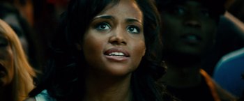 Movie still from “Unstoppable” (2010), directed by Tony Scott – A person looking up at the sky; Close Up shot, Low angle