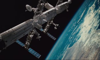 Movie still from “Until the End of the World” (1991), directed by Wim Wenders – A view of the earth from the space station; Extreme Wide shot, Low angle