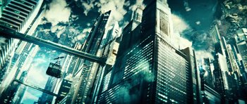 A view of skyscrapers in a city with a cloudy sky