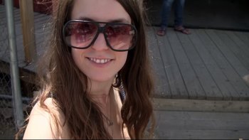 Movie still from “V/H/S” (2012), directed by Joe Swanberg – A person wearing sunglasses; Close Up shot, High angle