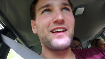 Movie still from “V/H/S” (2012), directed by Joe Swanberg – A person with a beard looking up; Close Up shot, Over the shoulder angle