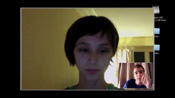 Movie still from “V/H/S” (2012), directed by Joe Swanberg – A young woman is taking a selfie on her phone; Close Up shot, Low angle