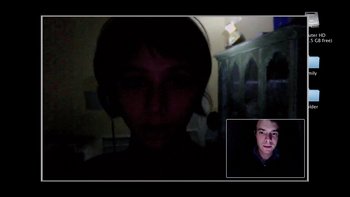 Movie still from “V/H/S” (2012), directed by Joe Swanberg – A man is taking a picture of a woman in a dark room; Medium shot, High angle