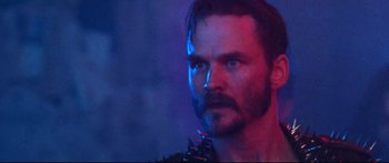 Movie still from “VFW” (2019), directed by Joe Begos – A person with a beard; Close Up shot, Low angle