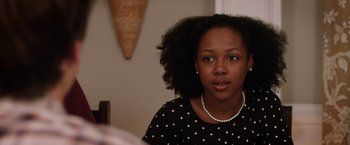 Movie still from “Vacation” (2015), directed by John Francis Daley – A woman in a polka dot shirt and a pearl necklace; Close Up shot, Over the shoulder angle