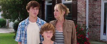 Movie still from “Vacation” (2015), directed by John Francis Daley – A woman standing next to two young boys; Medium shot, Over the shoulder angle
