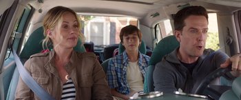 Movie still from “Vacation” (2015), directed by John Francis Daley – A group of people sitting in the back of a van; Medium shot, Over the shoulder angle