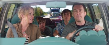 Movie still from “Vacation” (2015), directed by John Francis Daley – A group of people in the back seat of a car; Medium shot, Over the shoulder angle