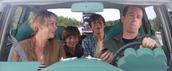 Movie still from “Vacation” (2015), directed by John Francis Daley – A group of people in the back seat of a car; Medium shot, Over the shoulder angle