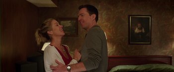 Movie still from “Vacation” (2015), directed by John Francis Daley – A man and a woman are laughing together in a living room; Close Up shot, Low angle
