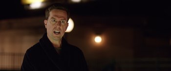 Movie still from “Vacation” (2015), directed by John Francis Daley – A person wearing a black jacket; Close Up shot, Over the shoulder angle