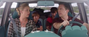 Movie still from “Vacation” (2015), directed by John Francis Daley – A group of people sitting in the back of a car; Medium shot, Over the shoulder angle