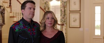 Movie still from “Vacation” (2015), directed by John Francis Daley – A man and a woman standing next to each other in a room; Close Up shot, Over the shoulder angle