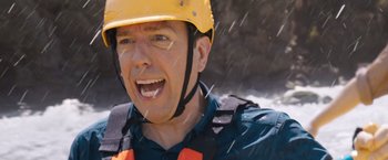 Movie still from “Vacation” (2015), directed by John Francis Daley – A man wearing a yellow hard hat and a life vest; Close Up shot, Low angle
