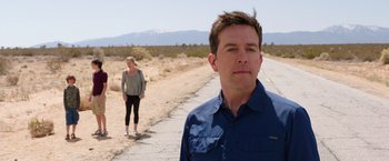 Movie still from “Vacation” (2015), directed by John Francis Daley – A man and a woman standing on the side of a road; Medium shot, Over the shoulder angle