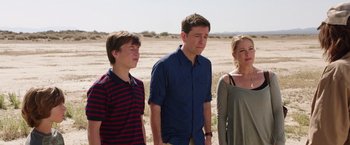 Movie still from “Vacation” (2015), directed by John Francis Daley – A man and two women standing next to each other in the desert; Medium shot, Over the shoulder angle