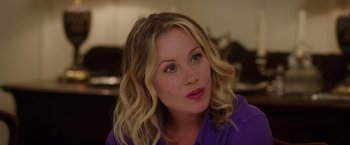 Movie still from “Vacation” (2015), directed by John Francis Daley – A person wearing a purple shirt; Close Up shot, Over the shoulder angle