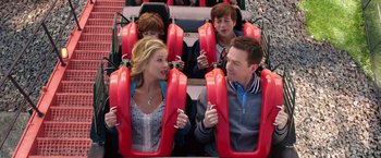 Movie still from “Vacation” (2015), directed by John Francis Daley – A group of people riding a roller coaster together; Medium shot, Over the shoulder angle