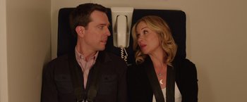 Movie still from “Vacation” (2015), directed by John Francis Daley – A man and a woman standing next to each other in front of a phone; Close Up shot, Over the shoulder angle