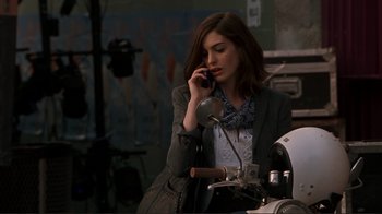 Movie still from “Valentine's Day” (2010), directed by Garry Marshall – A woman sitting down talking on a cell phone; Medium shot, Over the shoulder angle