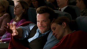 Movie still from “Valentine's Day” (2010), directed by Garry Marshall – A man and a woman sitting next to each other; Medium shot, High angle